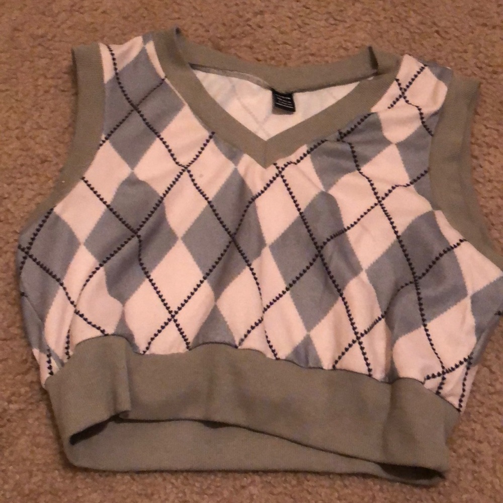 Selling Green and white vest for $8.00